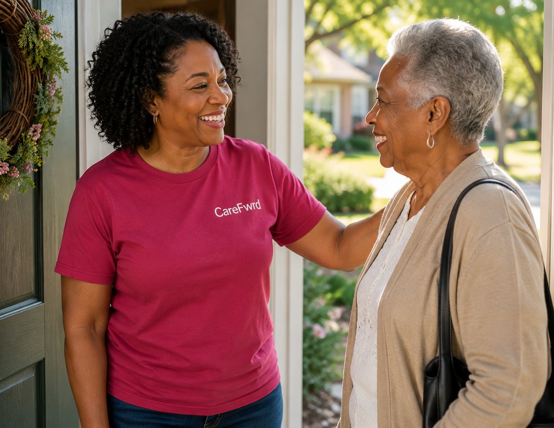 A CareFwrd team member in a CareCircle shirt warmly welcoming a member at her door